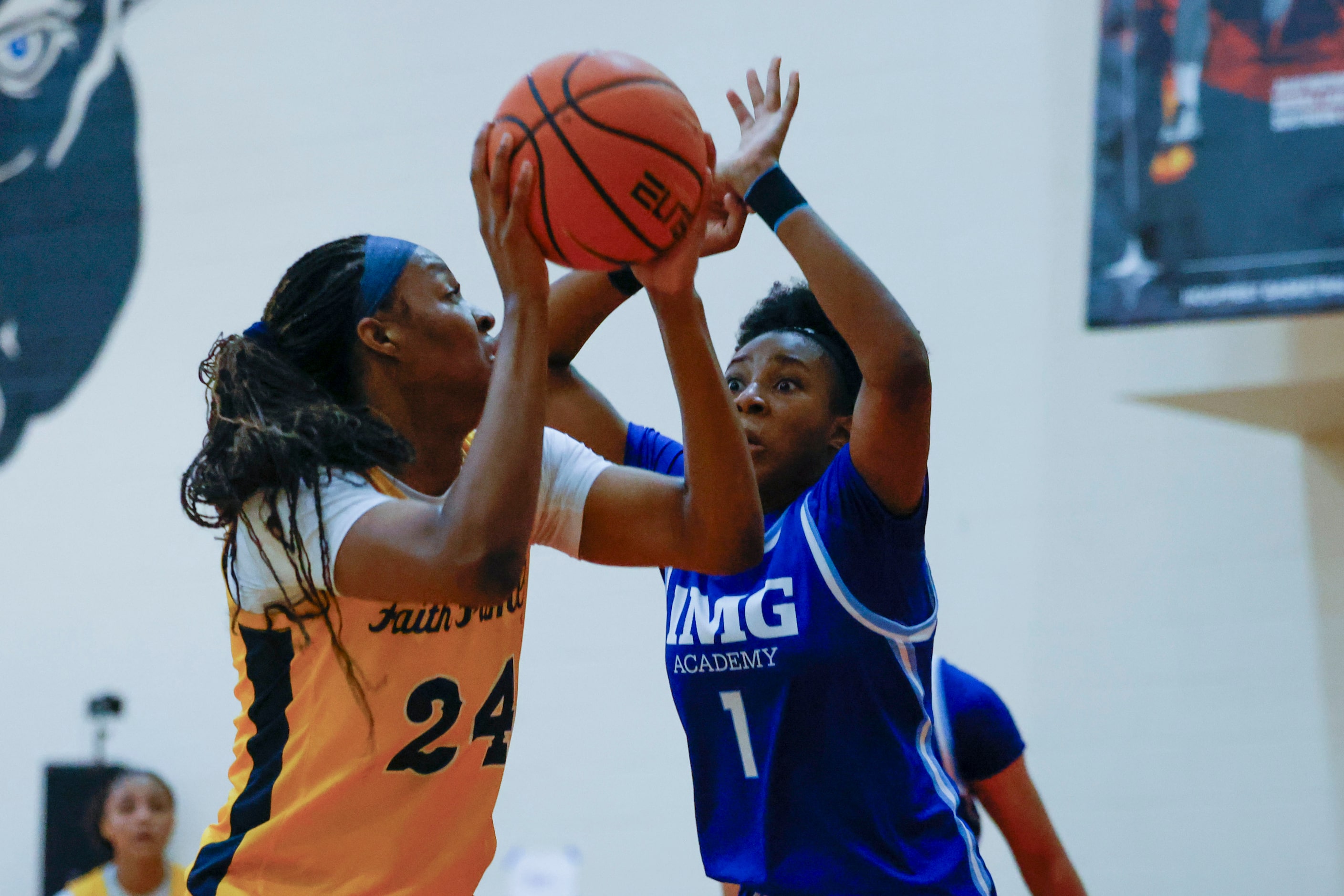 Oak Cliff Faith Family Academy’s Amari Byles (24) attempts to shoot against IMG Academy’s...