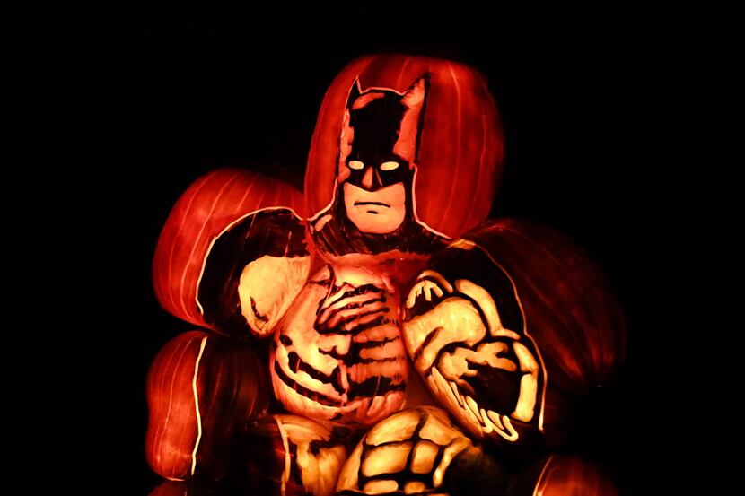 A Batman made from illuminated pumpkins is on display at the "Rise of the Jack O'Lanterns"...