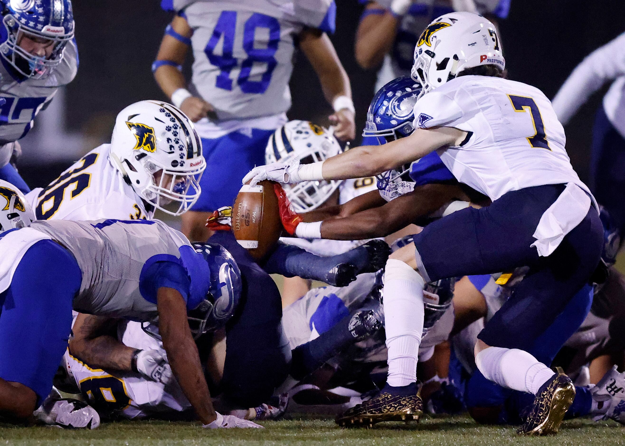 It was a mad scramble for the football by both Plano Prestonwood Christian Academy and Fort...
