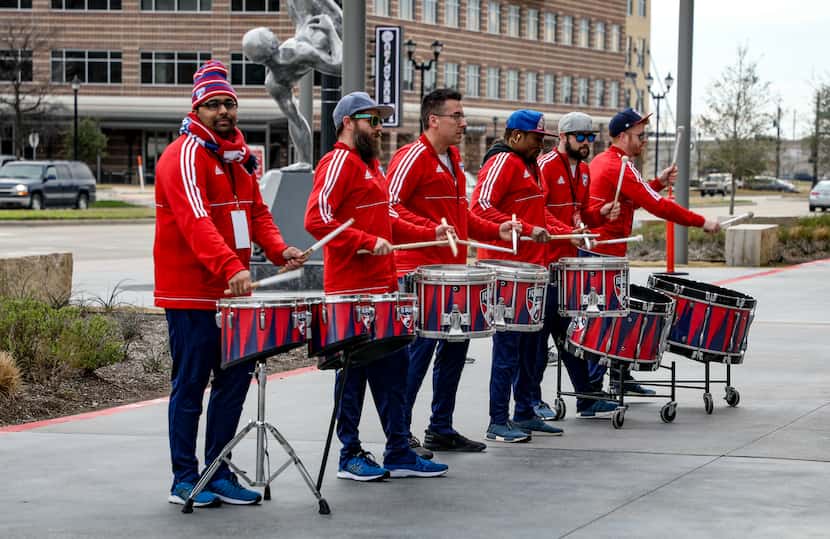 The FC Dallas Drumline entertains passersby outside the eMLS event.