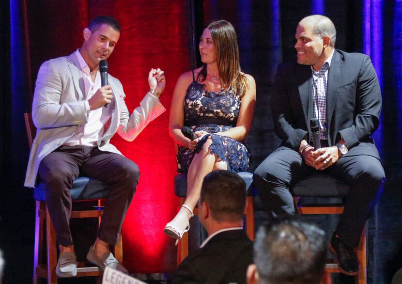 Former Texas Rangers Michael Young, left,   recalls his first baseball encounter with Ivan...