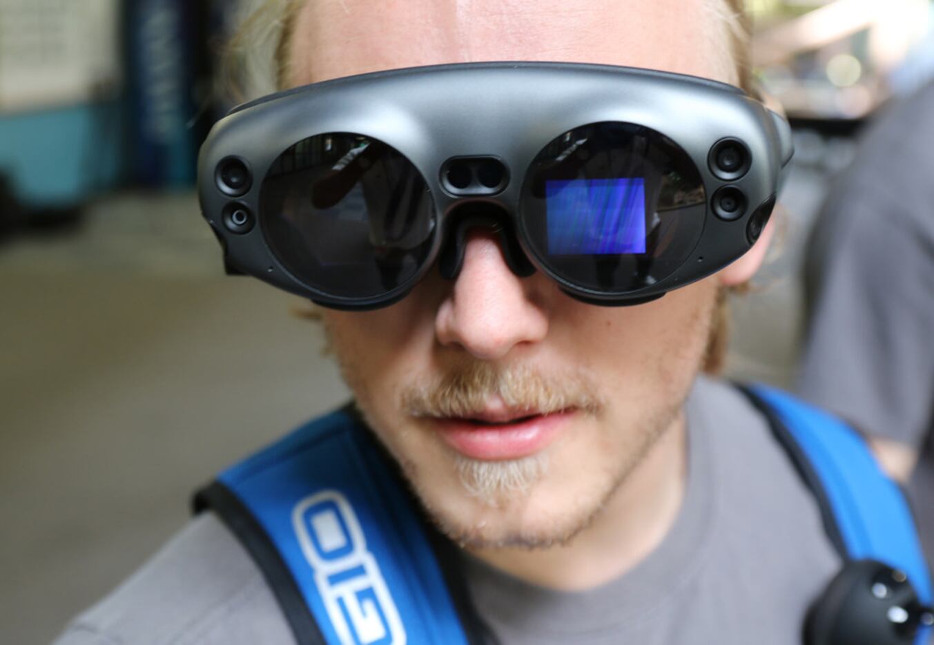 University of North Texas junior Andrew Jarrett tries out augmented reality goggles made by...
