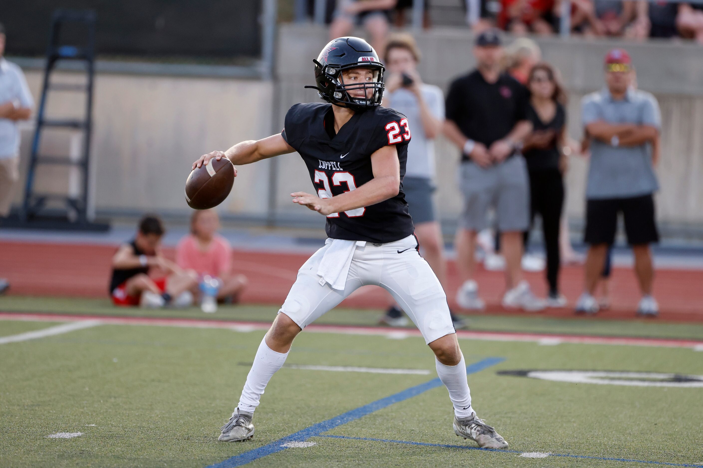 Coppell quarterback Jack Fishpaw (23) throws against Prestonwood Christian Academy during a...