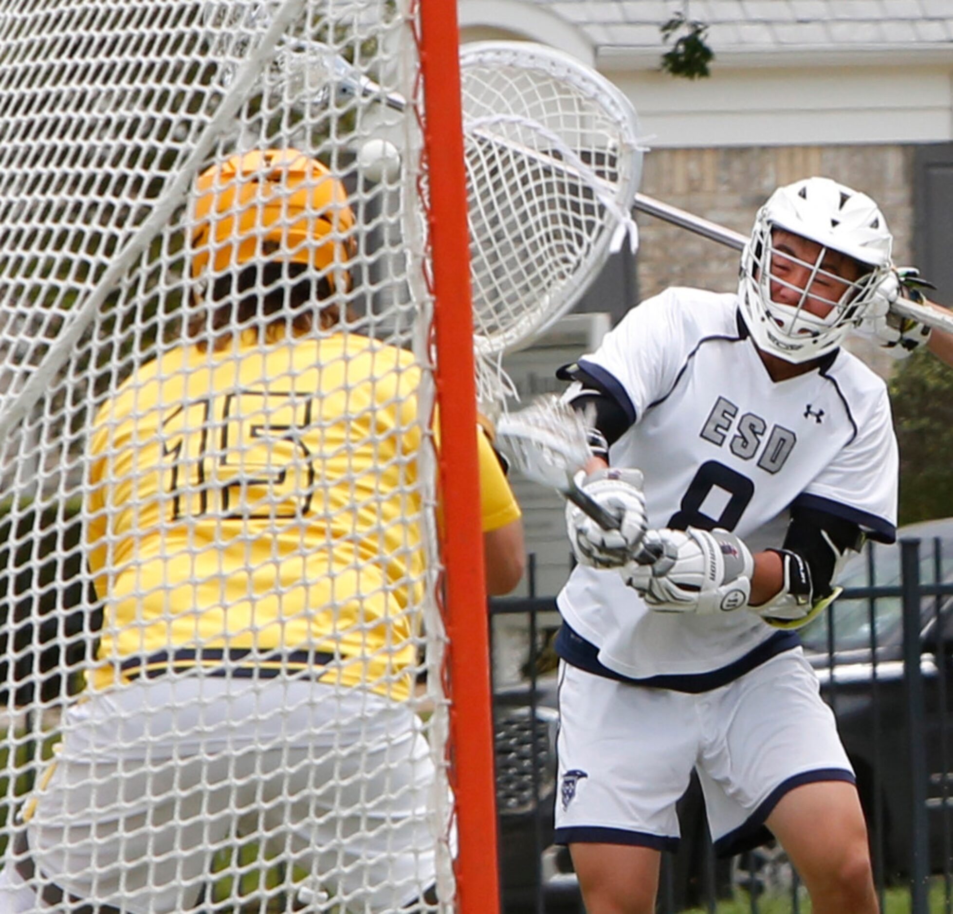 Episcopal School of Dallas midfielder Danny Kung (8) scores past the defense of St Mark's...