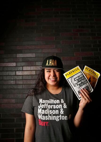 Senior Maya Quetzali, a fan of the Broadway musical 'Hamilton,' poses for a photograph with...