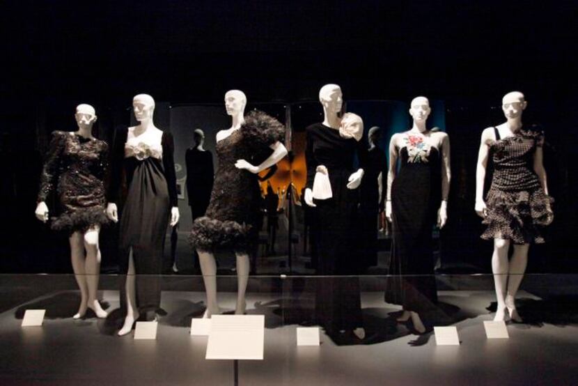 
Evening dresses from the late 1970s through the early 1990s, on display at the Oscar de la...