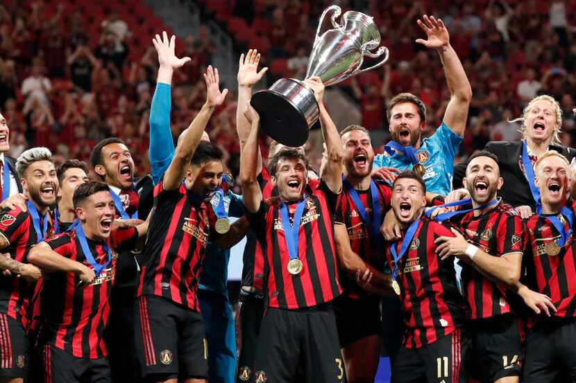 Atlanta United players celebrate after defeating the Minnesota United inthe U.S. Open Cup...