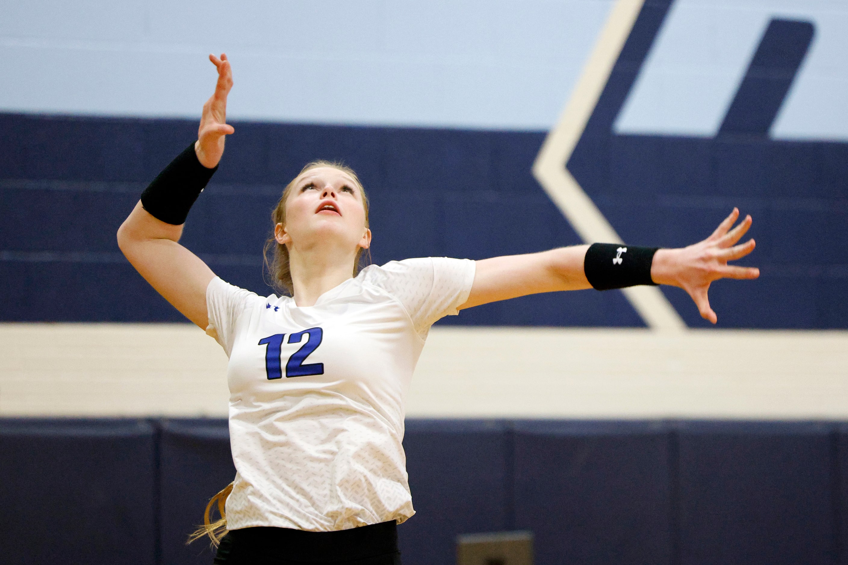 Trophy Club Byron Nelson's Ashlyn Seay (12) serves the ball during a volleyball match...