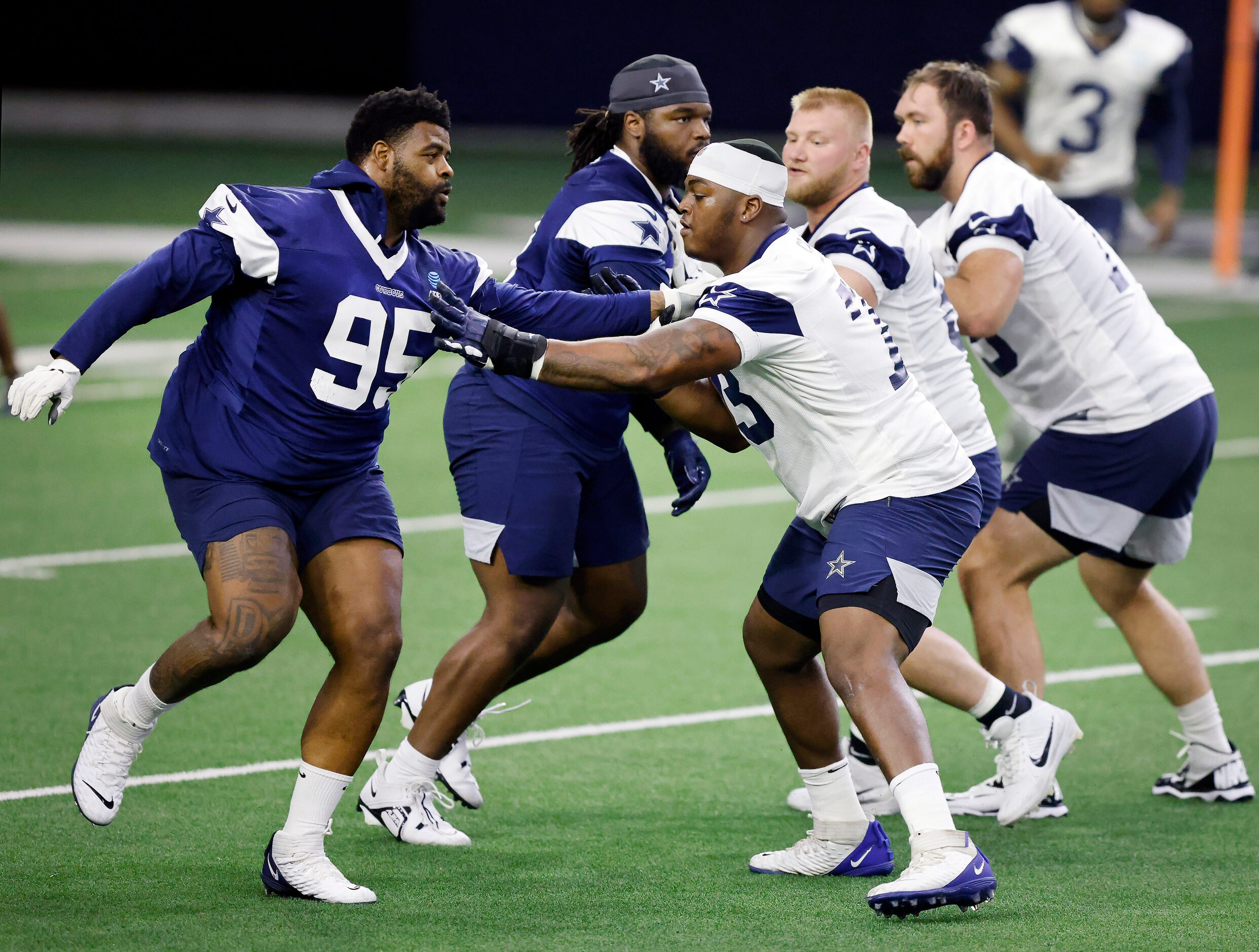 Dallas Cowboys offensive tackle Tyler Smith (73) blocks defensive tackle Johnathan Hankins...