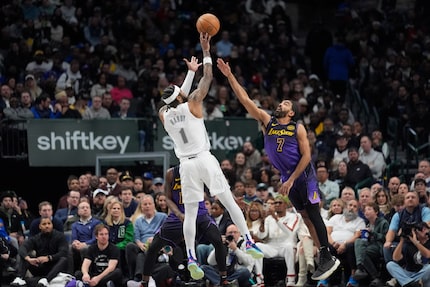 Dallas Mavericks guard Jaden Hardy (1) shoots against Los Angeles Lakers guard Gabe Vincent...