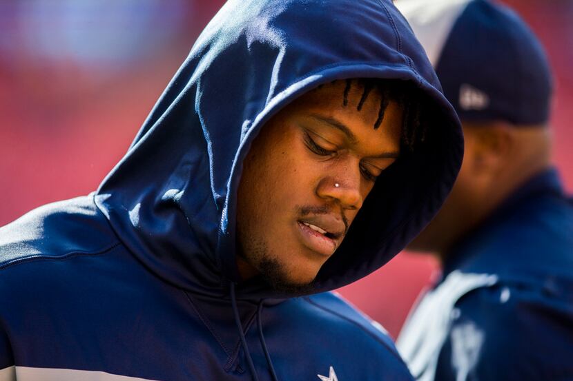 FILE - Cowboys defensive end Randy Gregory (94) warms up before a game against the...