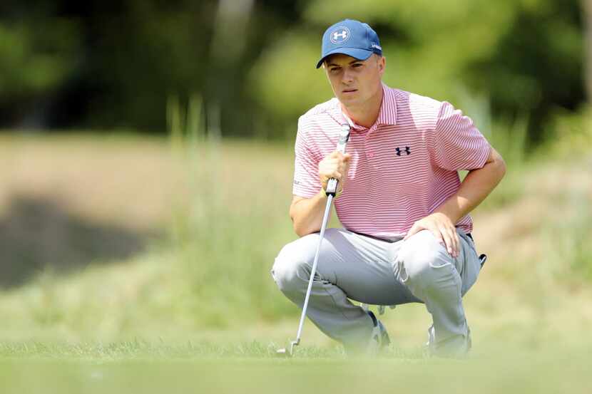 NORTON, MA - SEPTEMBER 04:  Jordan Spieth lines up a putt on the fourth green during the...
