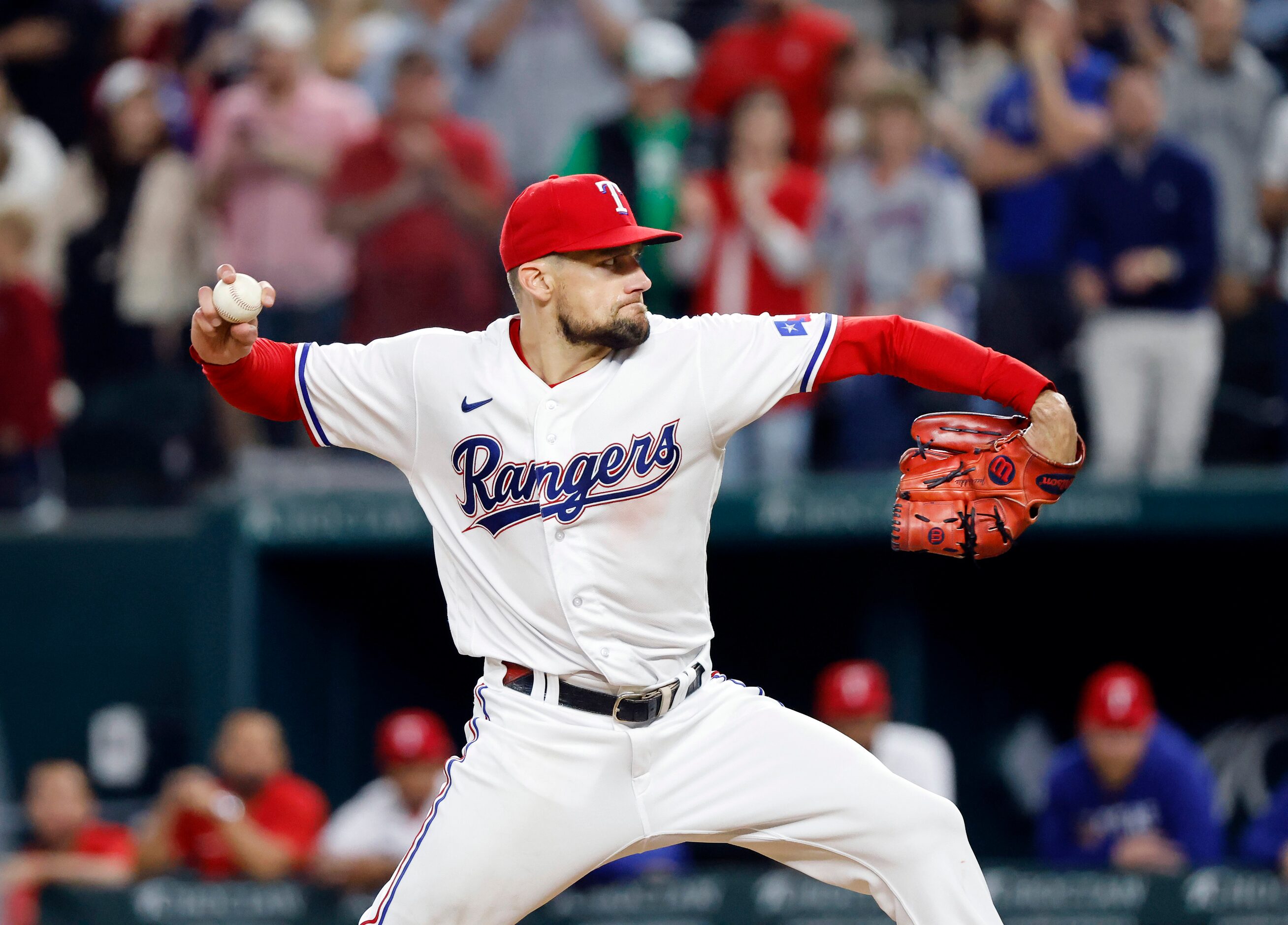 Texas Rangers starting pitcher Nathan Eovaldi (17) throws against the New York Yankees in...