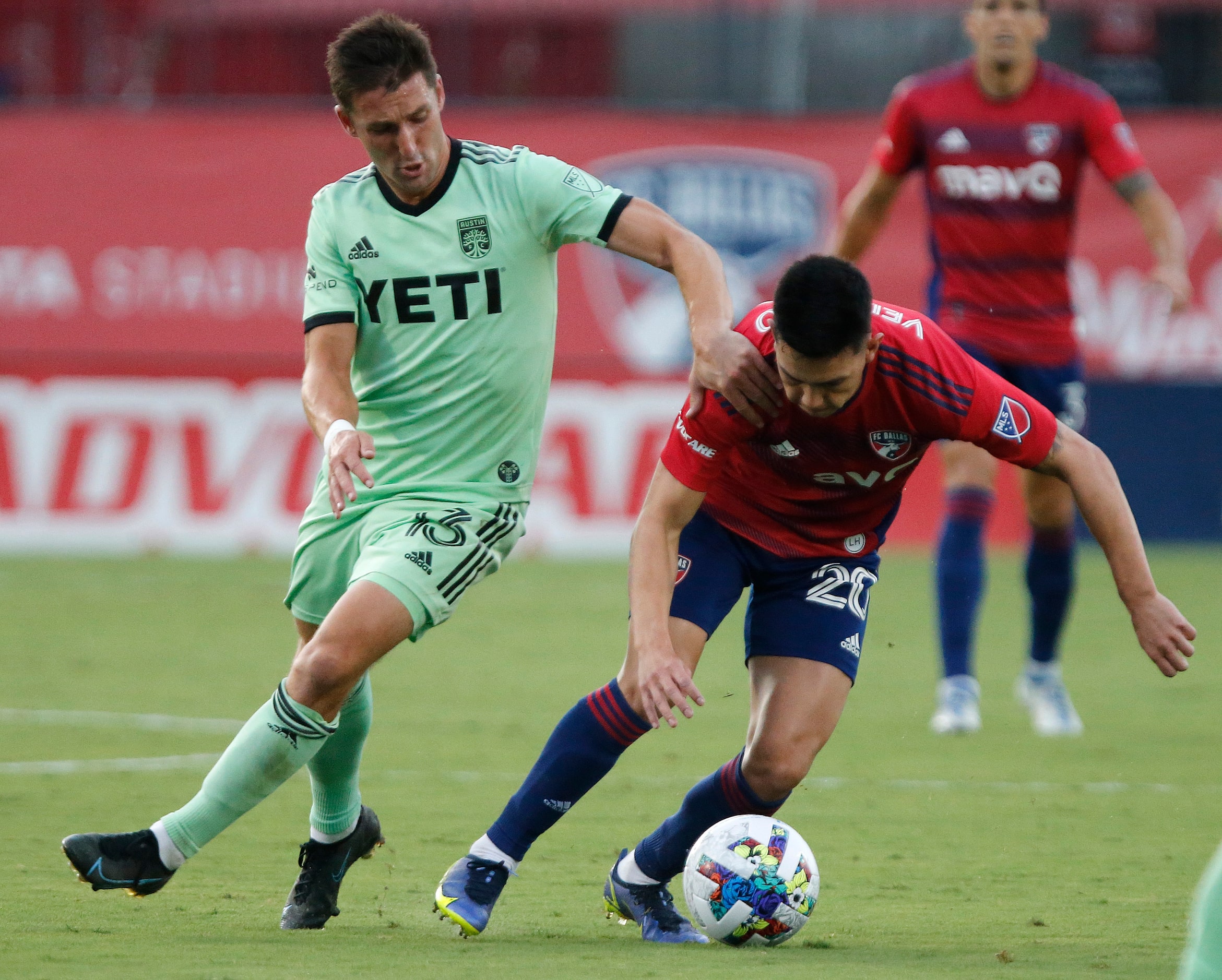 Austin FC midfielder Ethan Finlay (13) tries to get position on FC Dallas forward Alan...