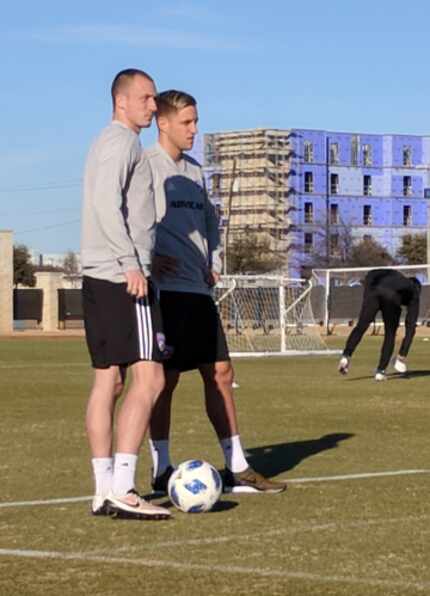 Anton Nedyalkov (left) and Reto Ziegler chat before FC Dallas training. (1-25-18)
