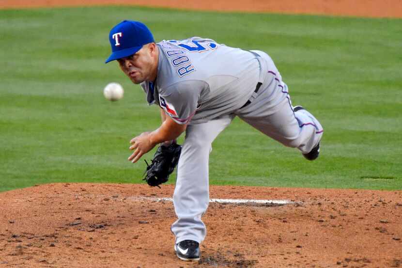Texas Rangers starting pitcher Wandy Rodriguez to a Los Angeles Dodgers batter during the...