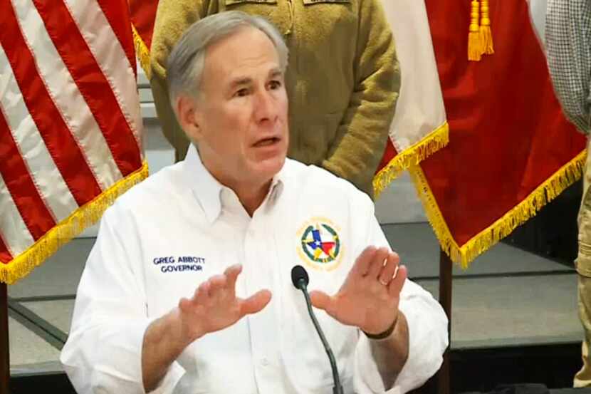 Governor Greg Abbott speaks during a press conference with an update on the state's response...