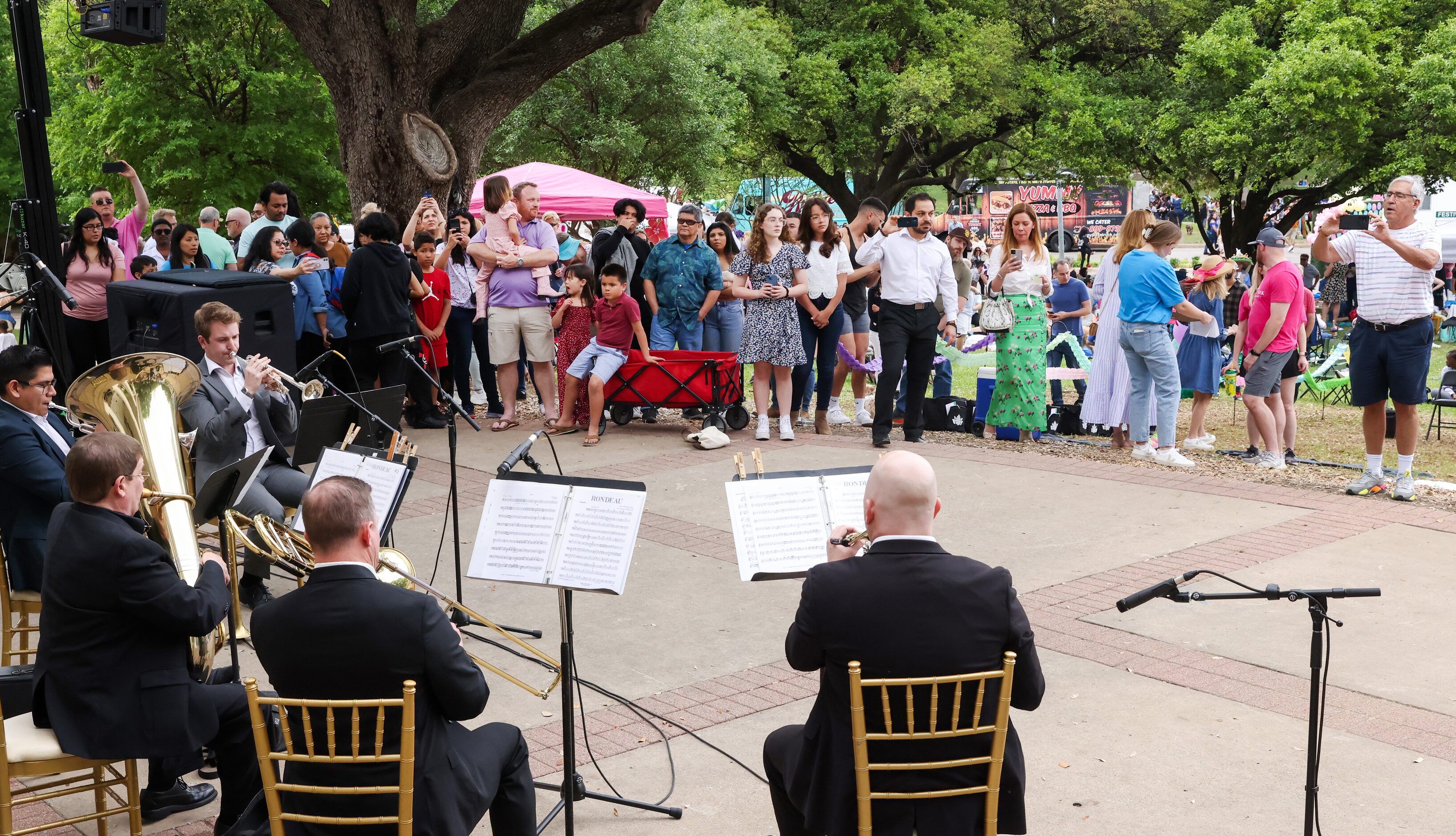 The Dallas Symphony Orchestra Brass Quintet performs for the crowd at Easter in Turtle Creek...