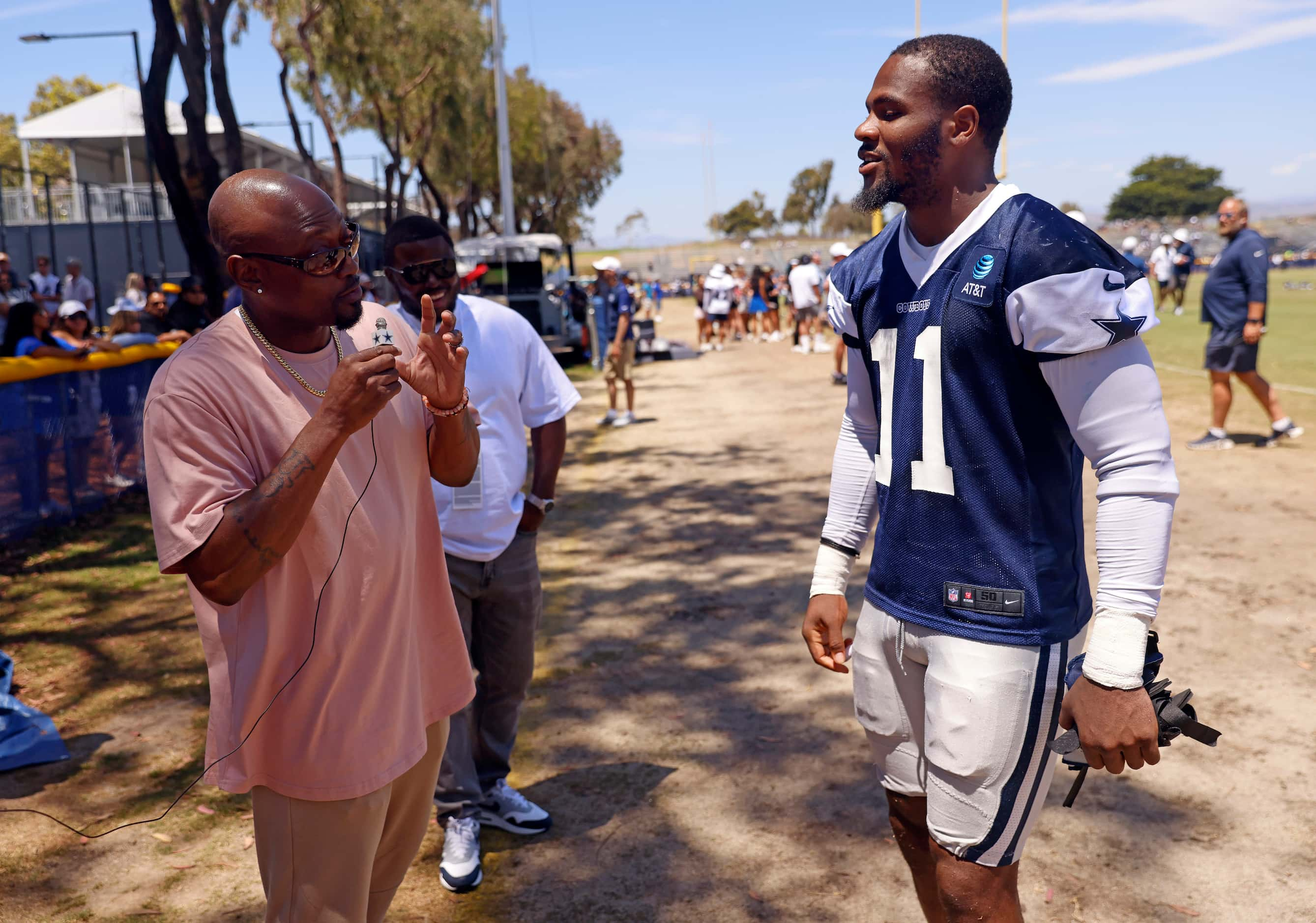 During a social media recording, actor and rapper Omar Epps (left) asks Dallas Cowboys...