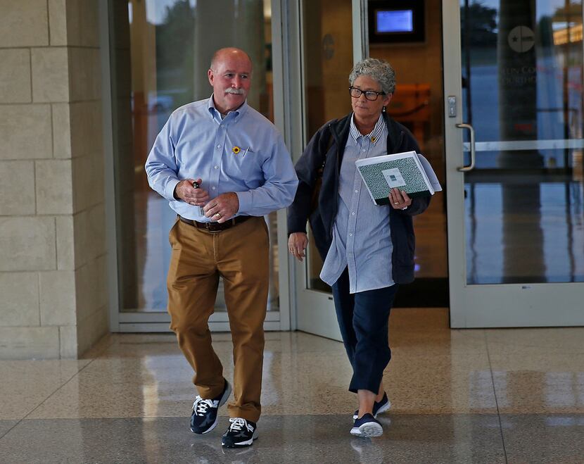 Gary Bardwell (left) and his wife, Gina Capley, leave the Collin County Courthouse on...