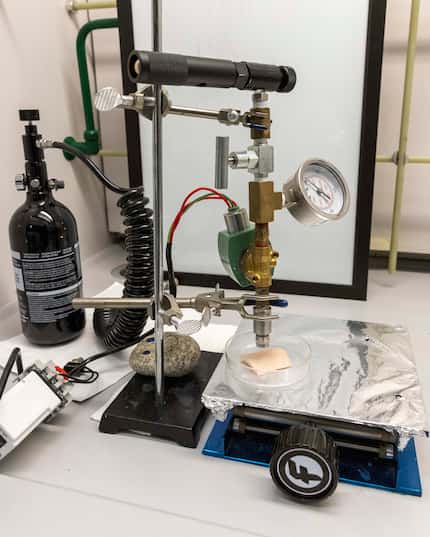 The air gun used to deliver vaccines with a puff of gas pictured at the University of Texas...