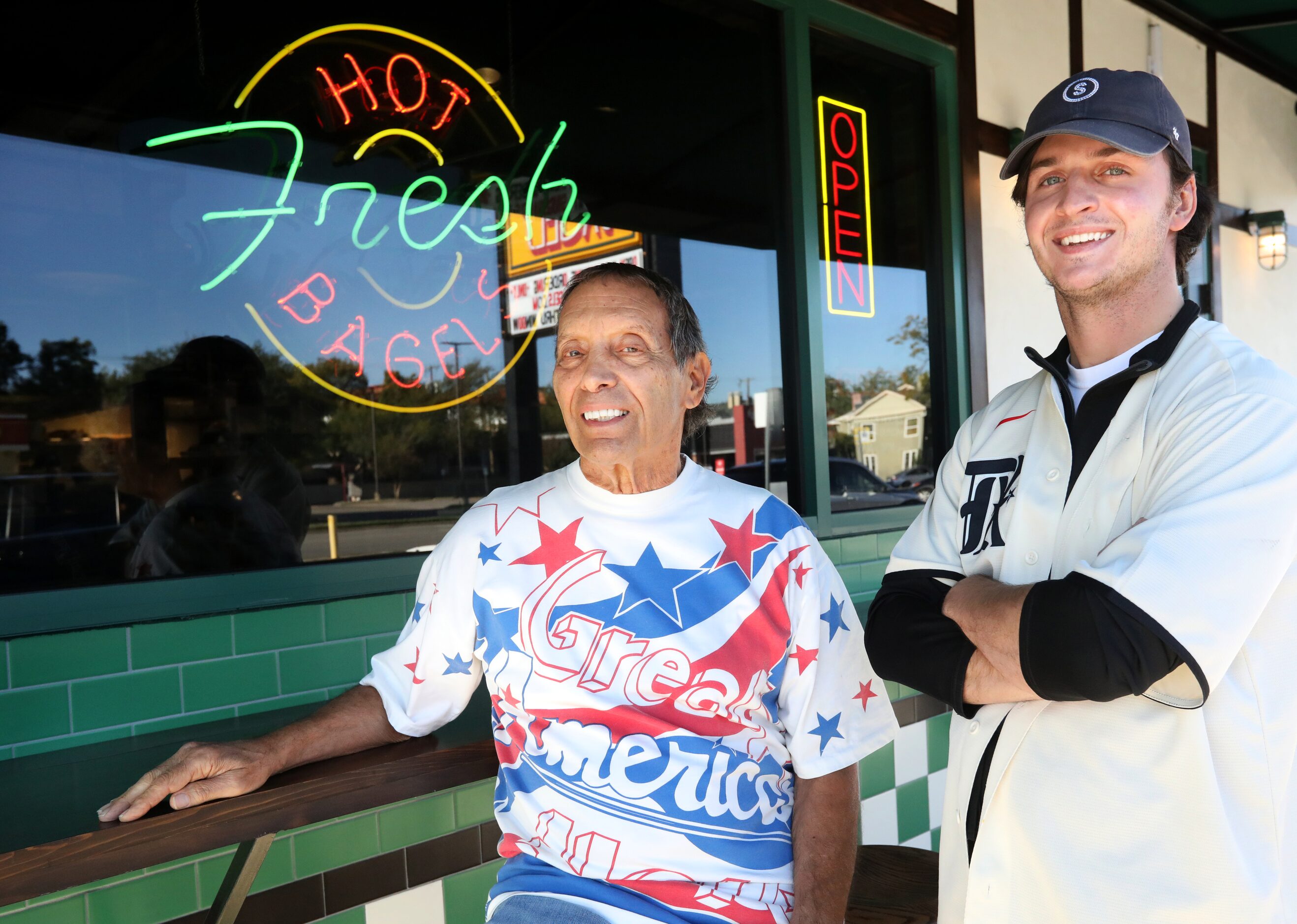 Dominick Oliverie, left, and Justin Shugrue pose for a photograph at Shug's Bagels in...