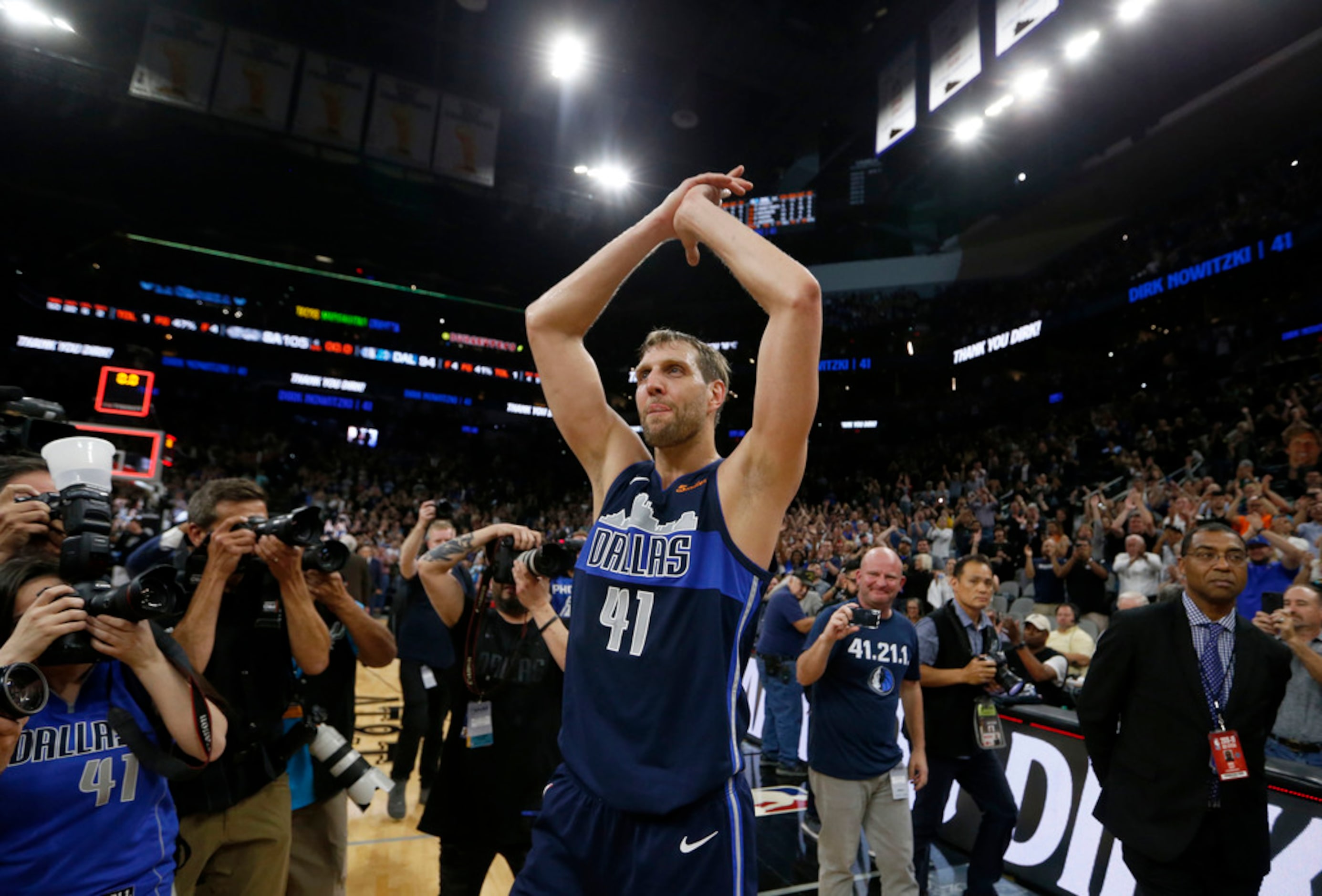 Dallas Mavericks forward Dirk Nowitzki (41) walks the court after the game against the San...