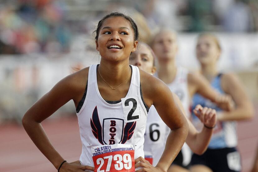 McKinney Boyd's Aaliyah Miller smiles after winning the class 6A girls 800-meter during the...