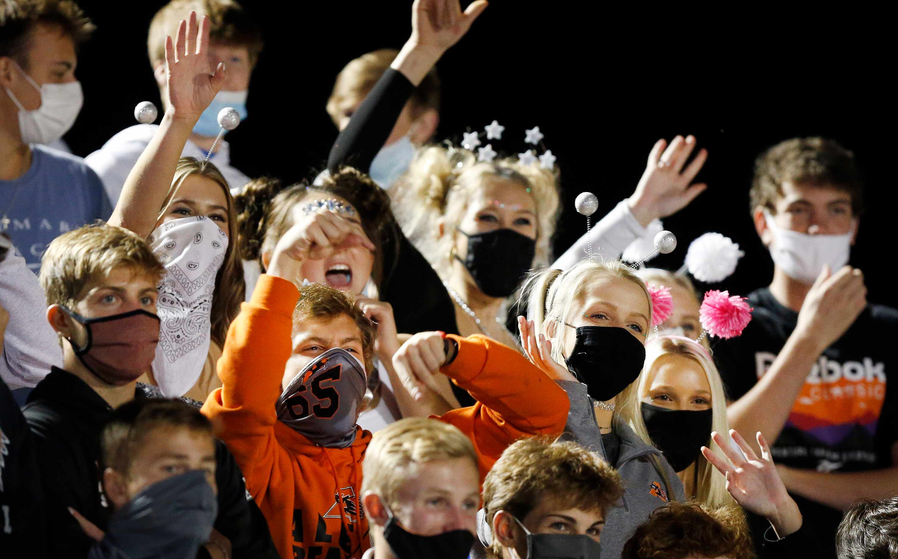 Aledo students cheer their team as they face Frisco Lone Star at Bearcat Stadium in Aledo,...