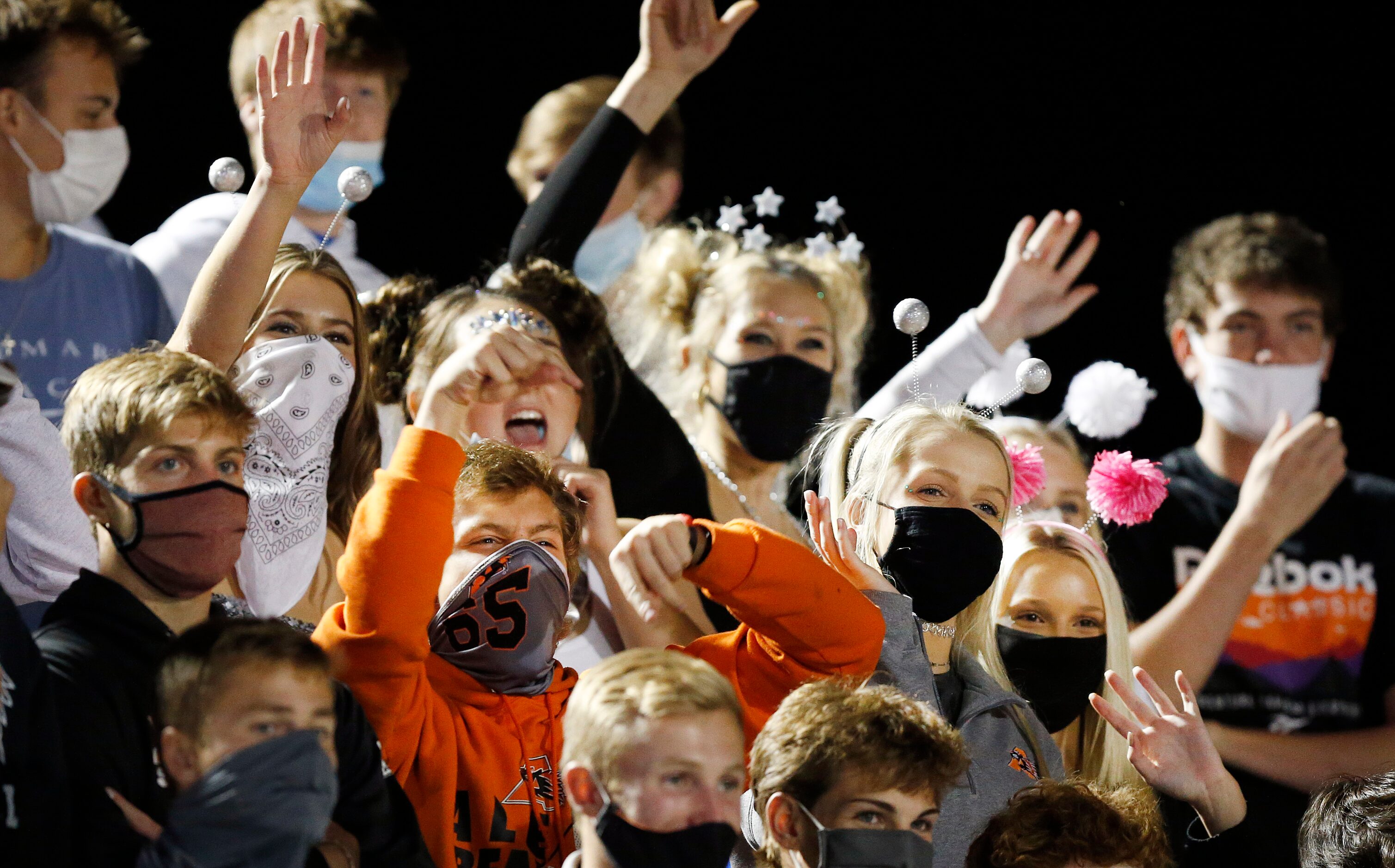 Aledo students cheer their team as they face Frisco Lone Star at Bearcat Stadium in Aledo,...