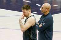 Dallas Mavericks guard Luka Doncic (77), left, and Dallas Mavericks head coach Jason Kidd...
