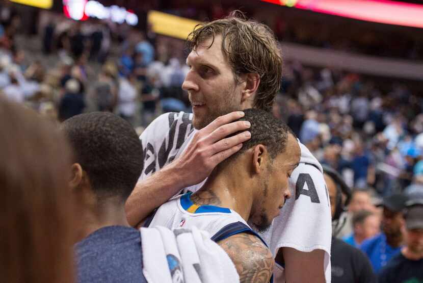 Mar 24, 2015; Dallas, TX, USA; Dallas Mavericks forward Dirk Nowitzki (41) and guard Monta...