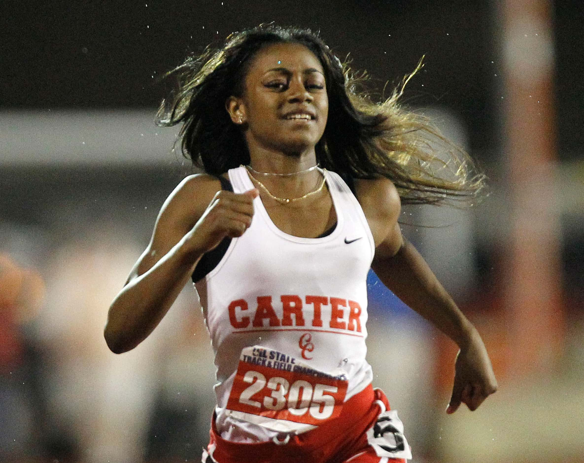 Dallas Carter's Sha'Carri Richardson competes in the class 4A girls 200-meter dash during...