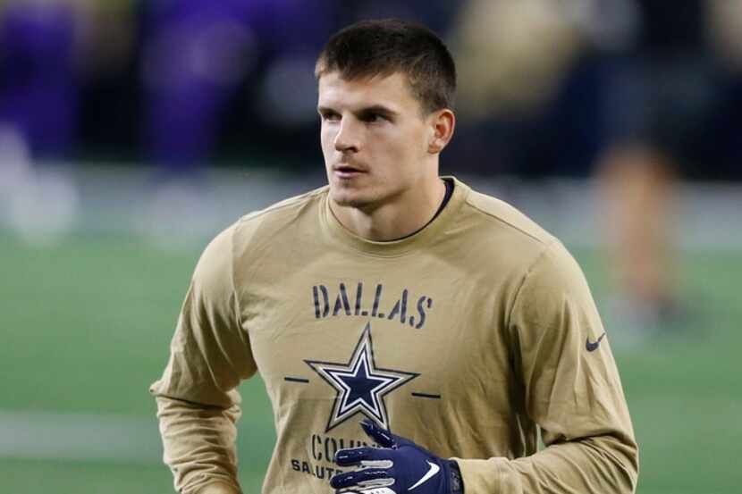 Dallas Cowboys strong safety Jeff Heath (38) stretches before a game against the Minnesota...