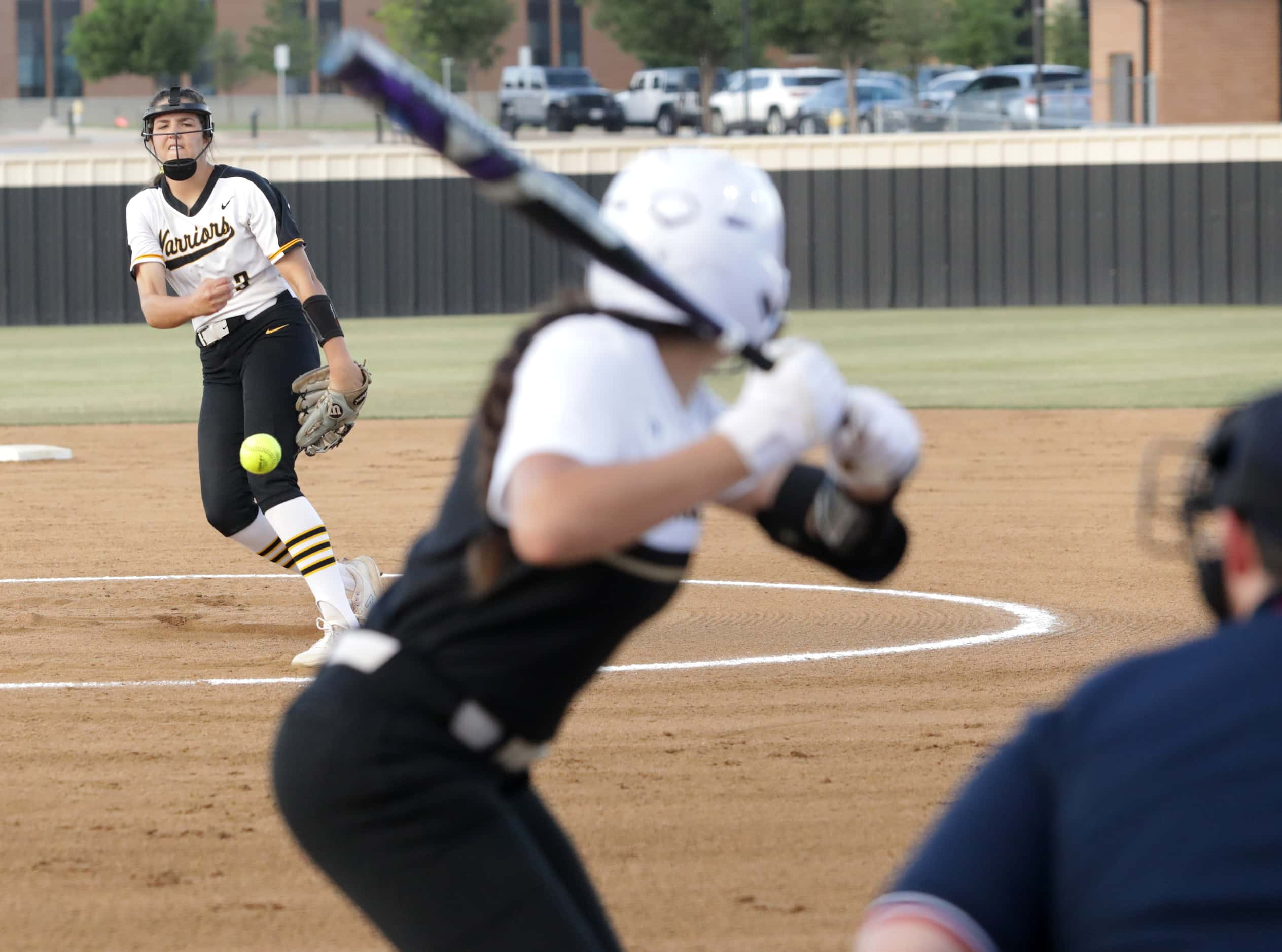 Frisco Memorial High School #13, Madelyn Muller, pitches to The Colony High School #11,...