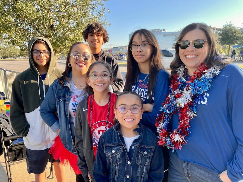 The Cortez and Ortiz families attend the Texas Rangers World Series Victory Parade Friday,...