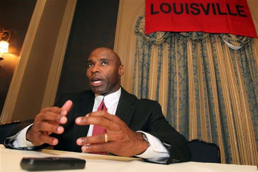Louisville head football coach Charlie Strong speaks to the media during the Big East...