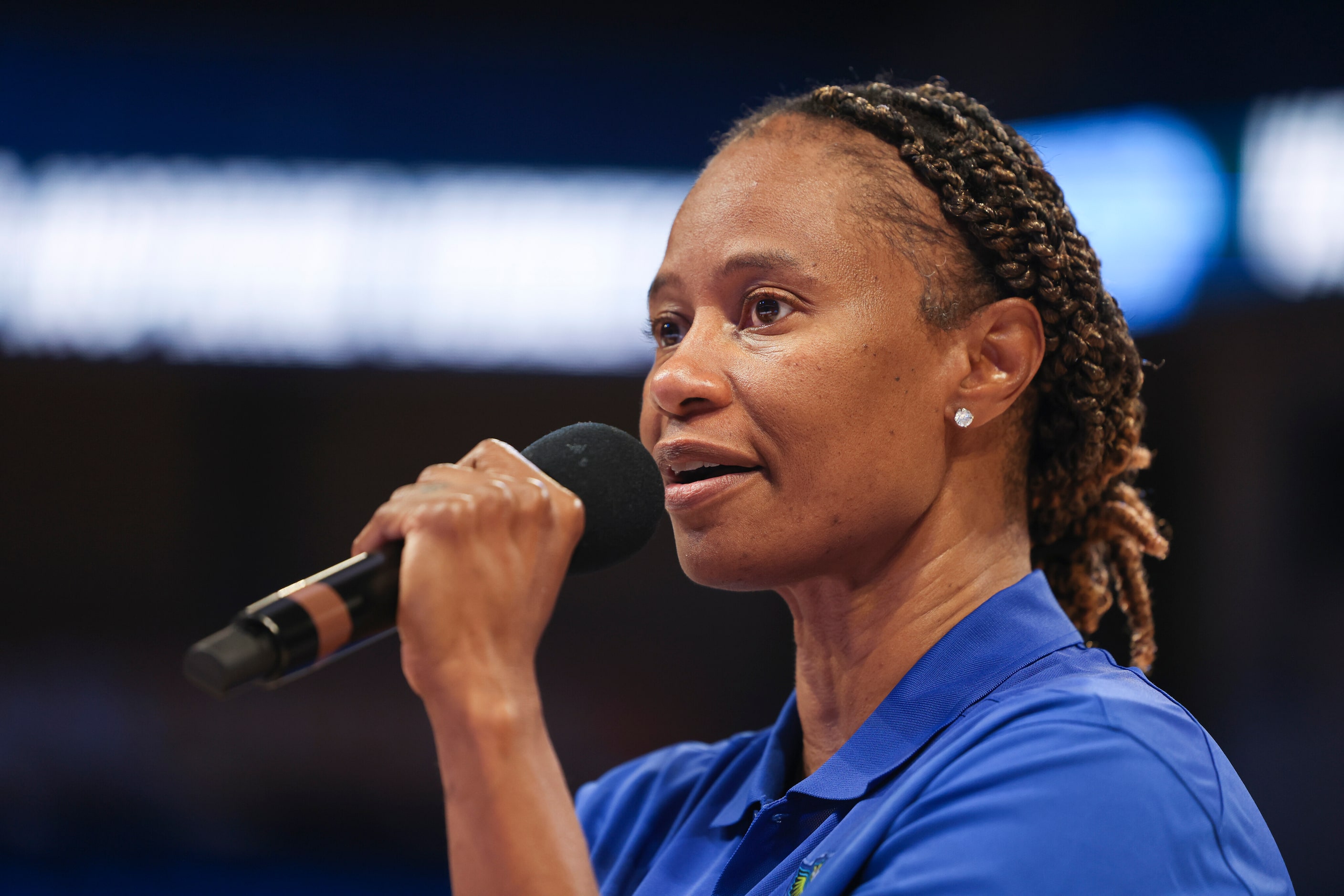 Vickie Johnson, Dallas Wings Head Coach, talks during a post-game panel on Inspiring Woman’s...