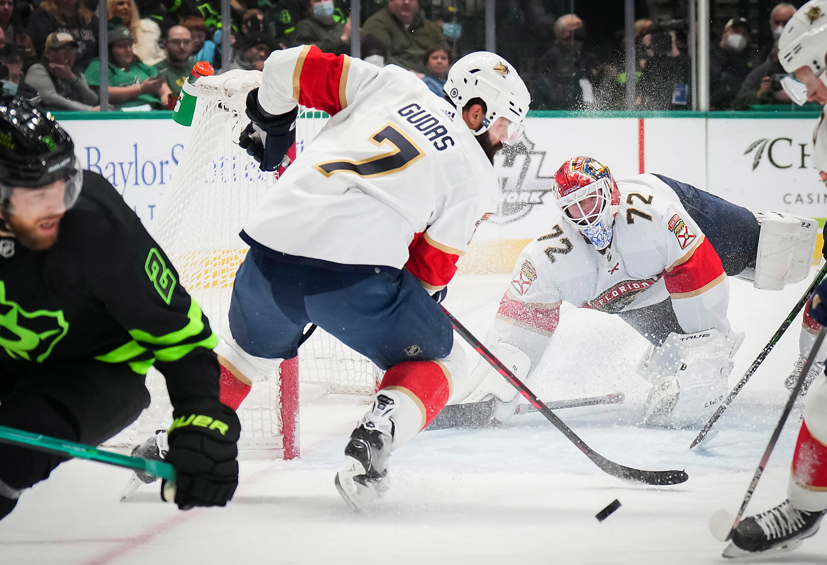 Florida Panthers goaltender Sergei Bobrovsky (72) eyes the puck as Dallas Stars defenseman...