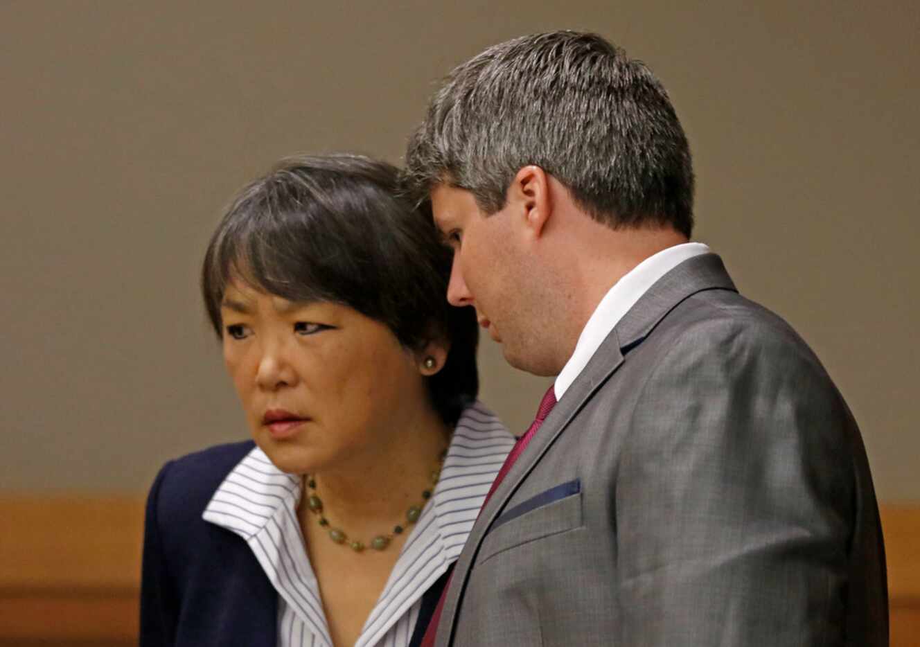 Defendant Jason Lowe (right) talks with his attorney Maria Tu during trial on Thursday,...