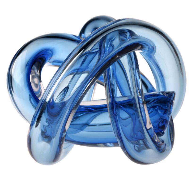 Knot now: Multiple hues of blue glow through this hand-blown glass knot by Czech company...