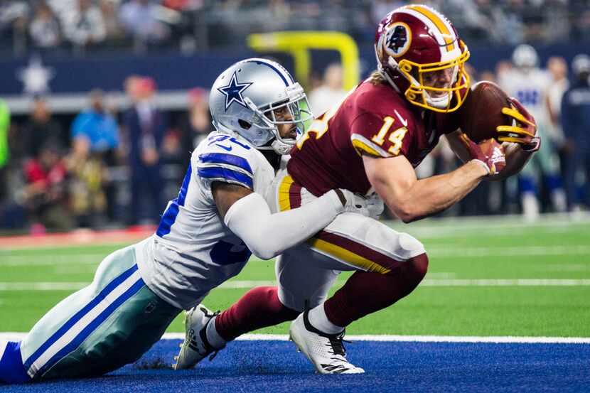 Dallas Cowboys cornerback Anthony Brown (30) tackles Washington Redskins wide receiver Trey...