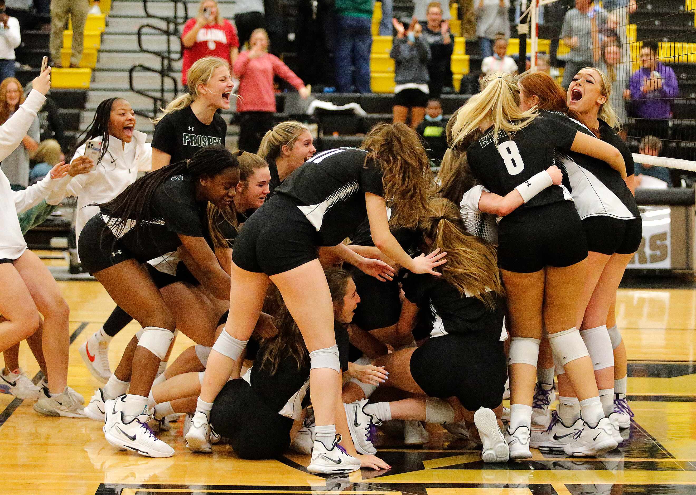 Prosper High School reacts as they win the first round Class 6A playoff match against Flower...