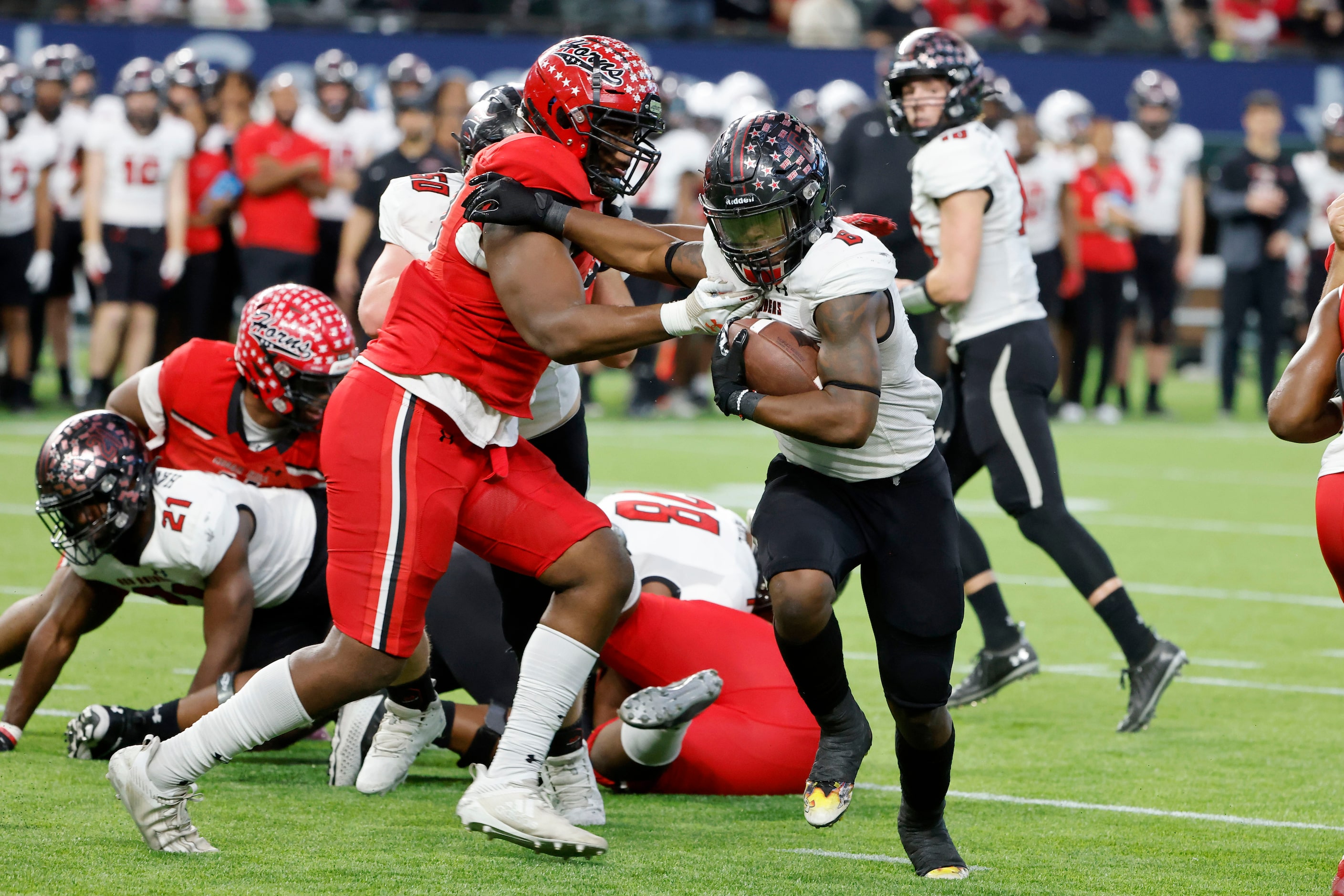 Tyler Legacy running back Bryson Donnell (6) scores a touchdown as Cedar Hill’s Luke...