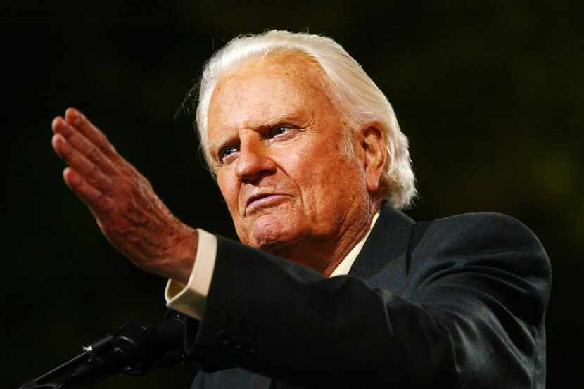 Rev. Billy Graham speaks to thousands of people during his New York Crusade at Flushing...