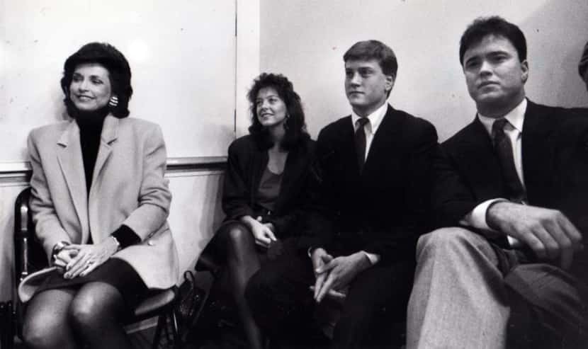 February 1989 - Jerry Jones' family listens during the first news conference held by the...