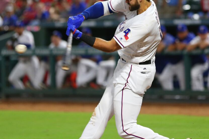 ARLINGTON, TX - SEPTEMBER 30: Joey Gallo #13 of the Texas Rangers hits his fortieth MLB home...