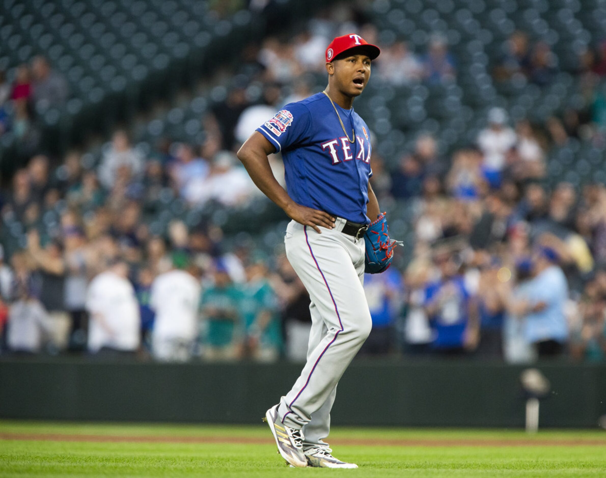 SEATTLE, WA - MAY 27:  Jose Leclerc #25 of the Texas Rangers reacts to the home by Daniel...