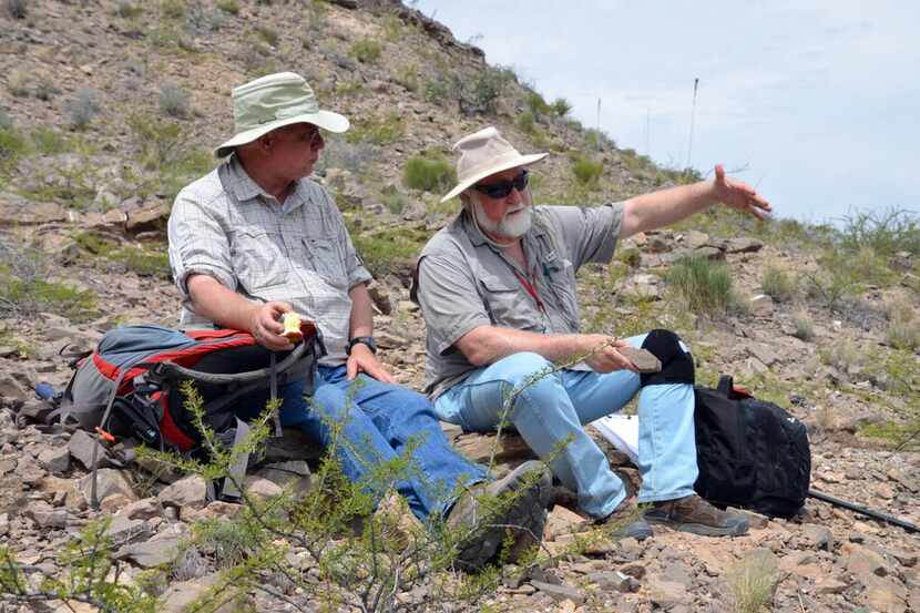 Louis Jacobs (left) and Steve May (right) discuss the geology of the Malone Mountains in...