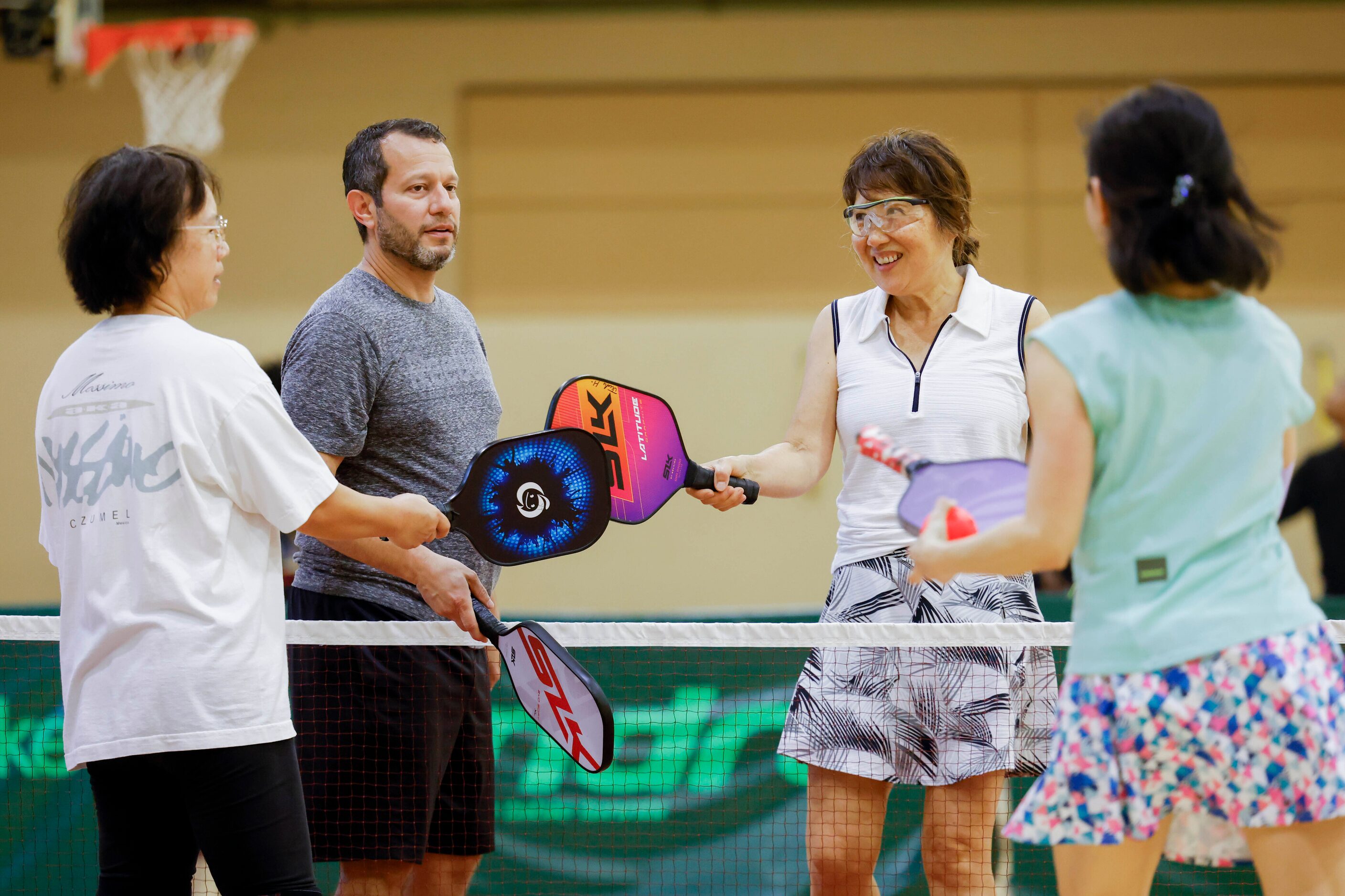 From left, Yawen Tiegerman of Frisco, Eric Spraul of Carrollton, Judy Hahn and Elaine Tan of...